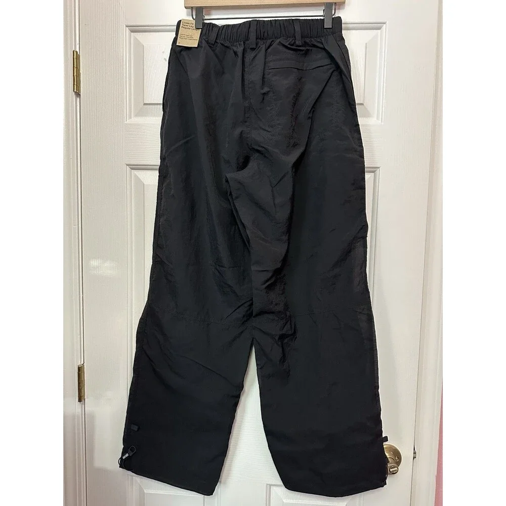 Size M Nike Mens Repel Tech Pack Lined Loose Taper Fit Pant Black FQ3868-010 NEW